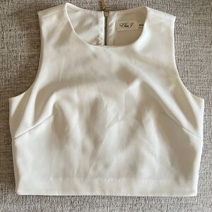White sleeveless top